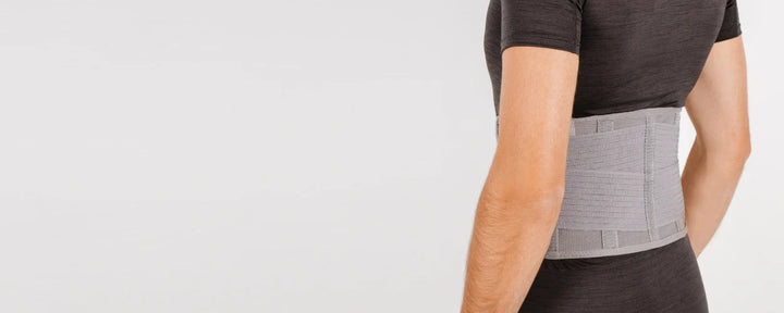 What are the benefits of wearing a corset for a pot belly?