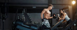 Gambar ini menunjukkan suasana gym yang aktif, menggambarkan pertanyaan umum banyak orang tentang apakah boleh gym setiap hari untuk mencapai hasil optimal